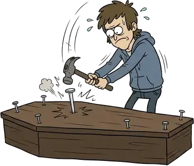 A man hammering a nail into the lid of a wooden coffin